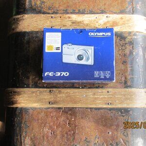 Olympus FE-370 8.0 Megapixels Digital Camera (new charger)